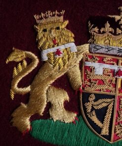 Hand embroidered Royal coat of arms British UK Royal coat of arms – handmade Bullion gold and silver wire embroidered on Maroon felt background . Coat of arms available with beautiful frames / without frame